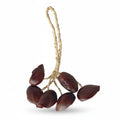 Brown juju nut shaker - nuts strung together with rope handle