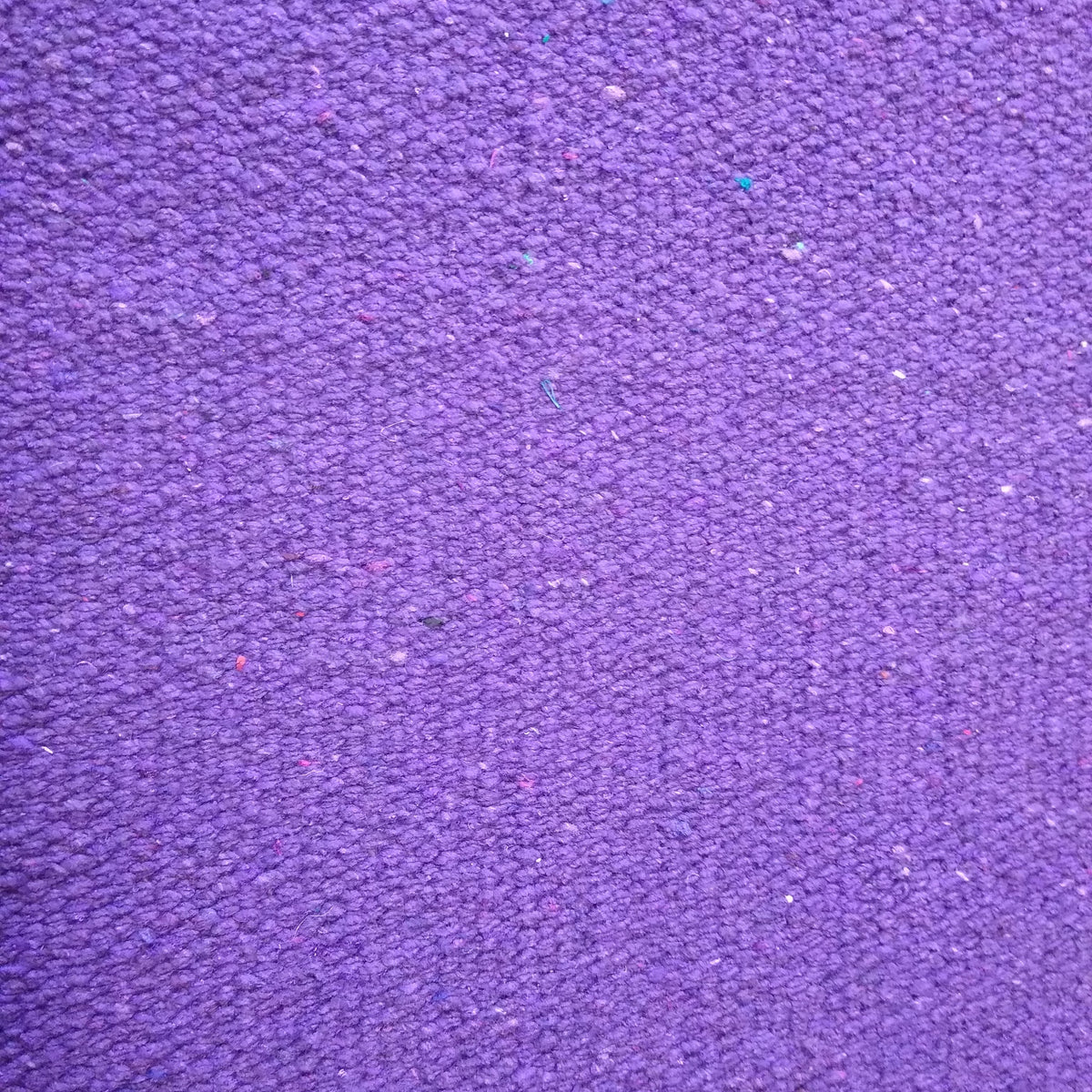 Close-up of lilac textured rug