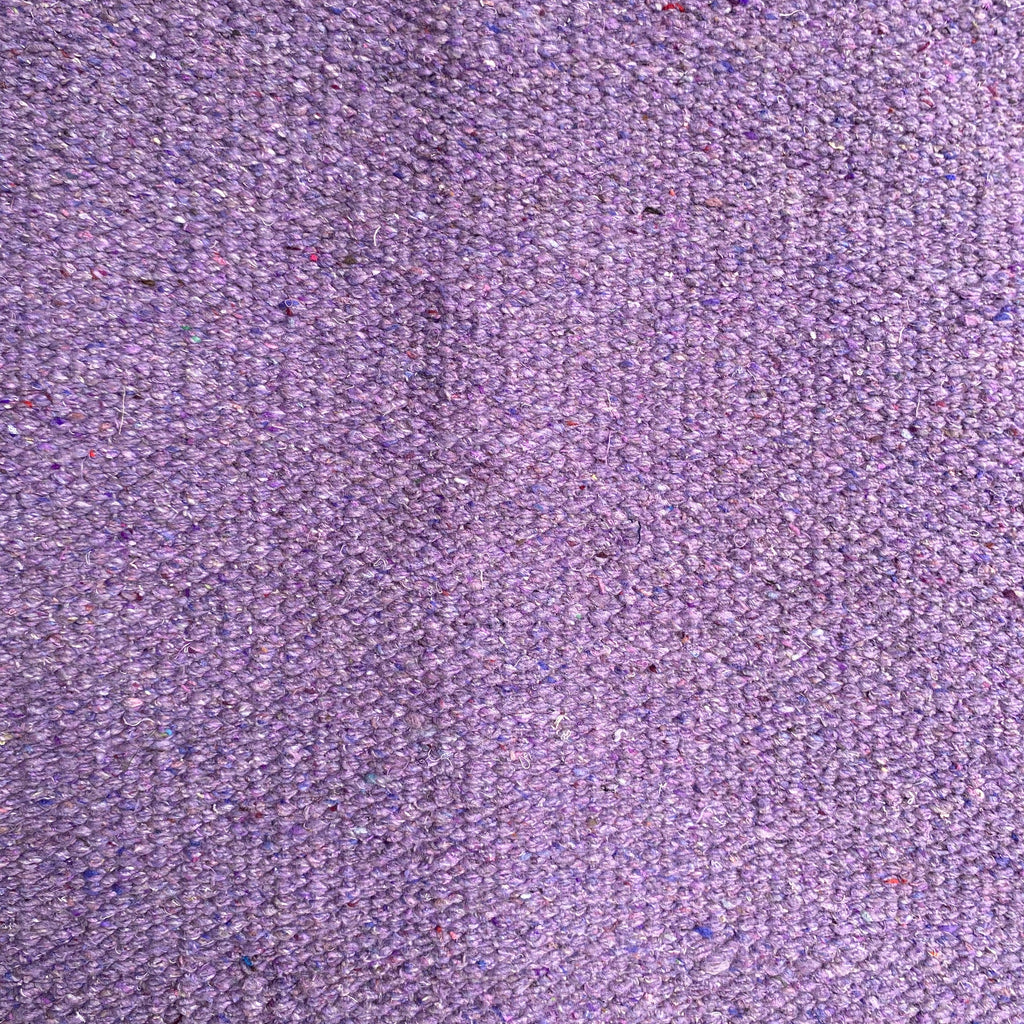 Close-up of lilac textured rug
