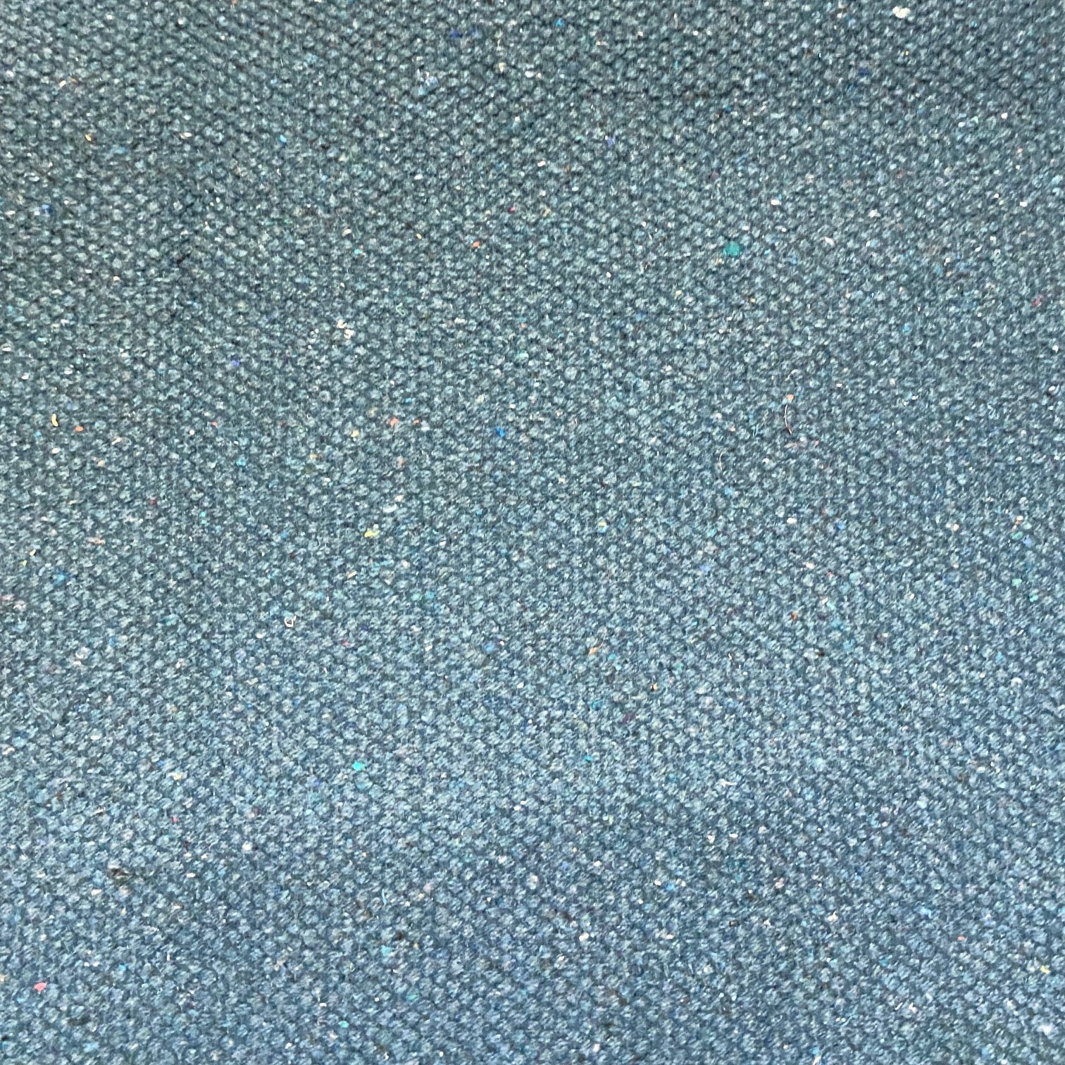 Close-up of mallard blue textured rug