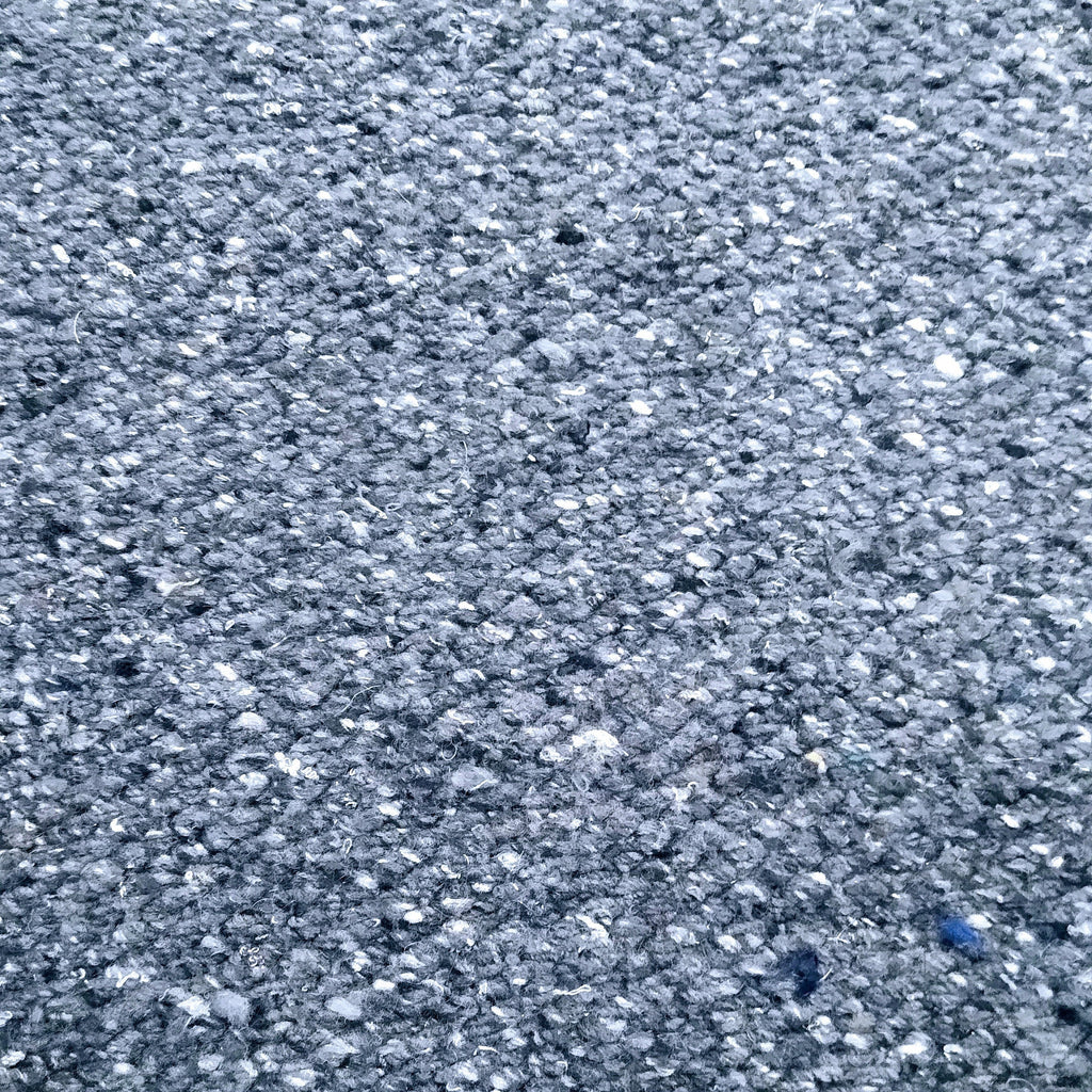 Close-up of mid grey textured rug