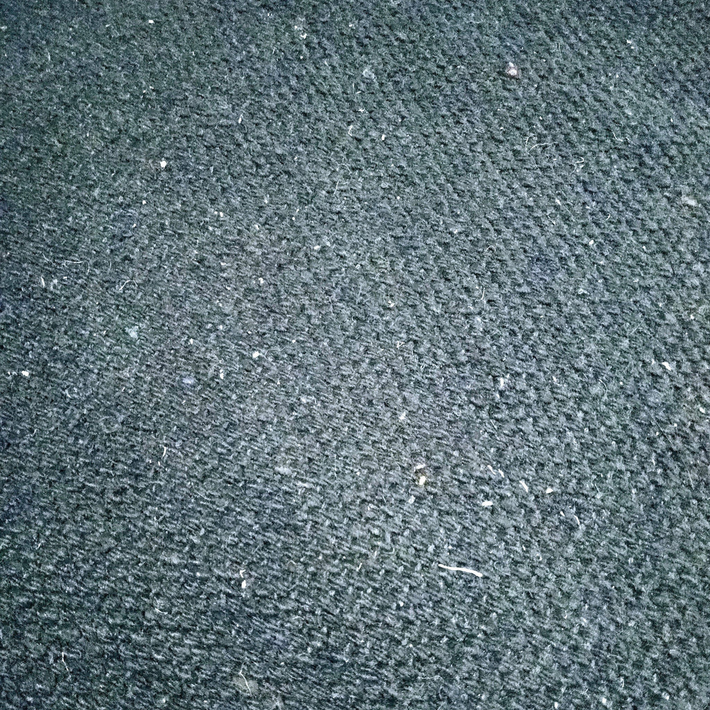 Close-up of mid grey textured rug