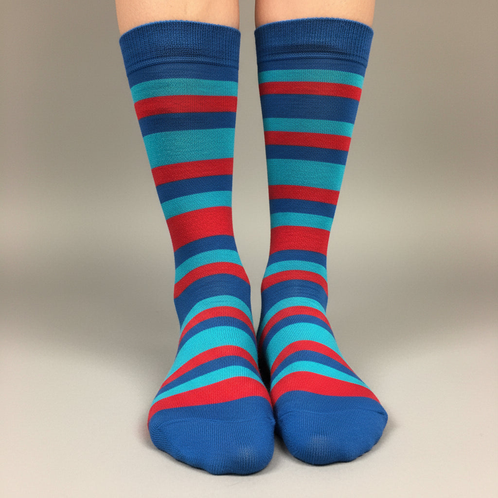 a pair of mo-so blue stripe socks with blue toe