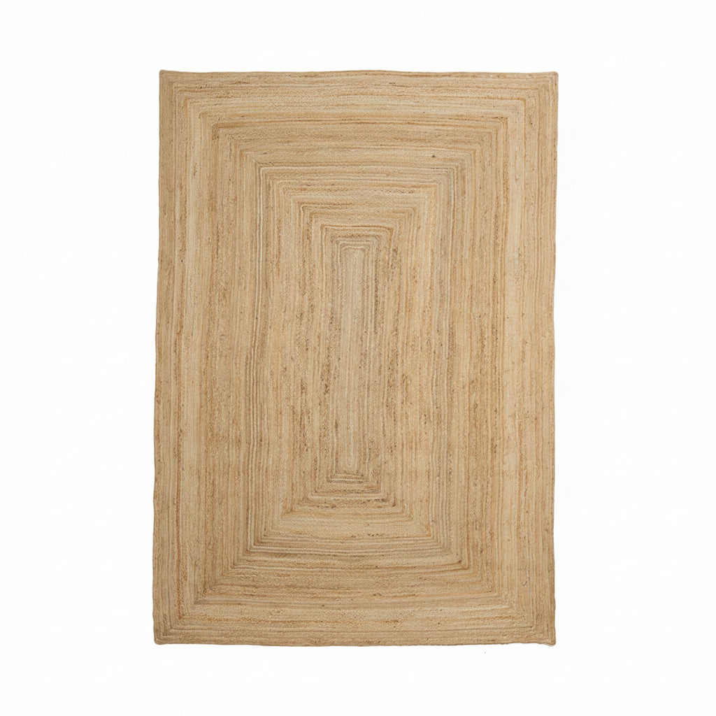 A beige braided jute rug with a natural texture, suitable for high footfall areas.