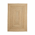 A beige braided jute rug with a natural texture, suitable for high footfall areas.