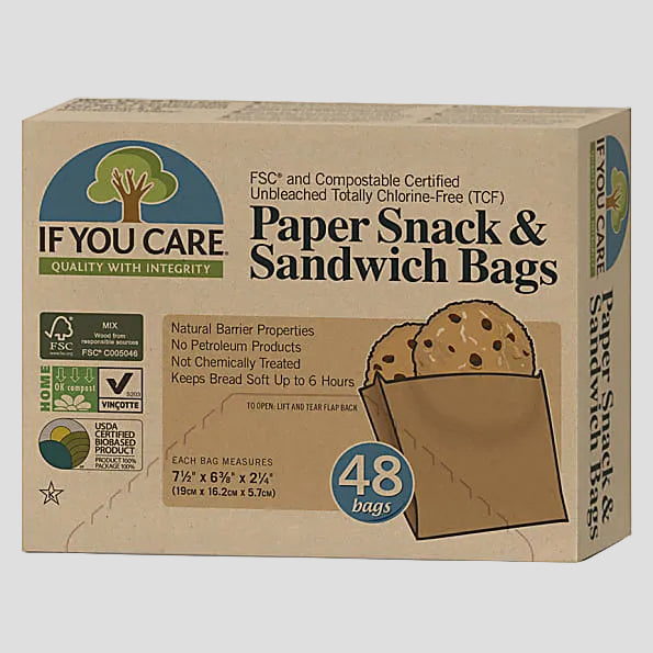 Paper sandwich and snack bags showing the product as 100% unbleached, compostable, and recyclable with a tree logo, and a graphic of a sandwich.