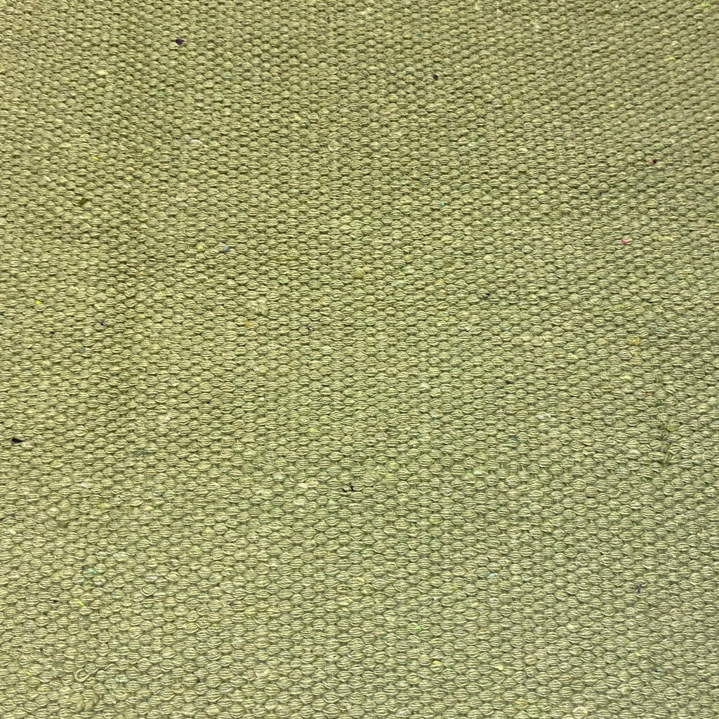 Close-up of sea green textured rug